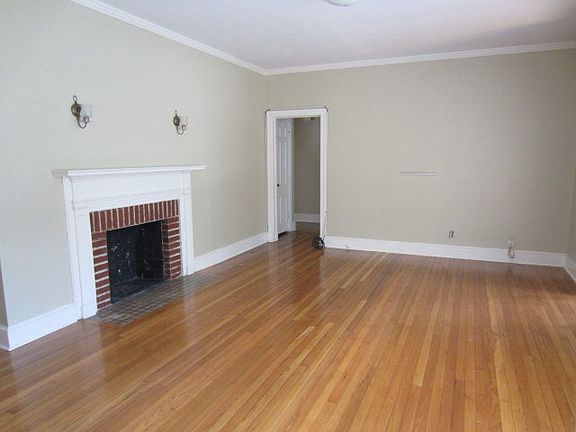 Great room, with fireplace and hardwood floors