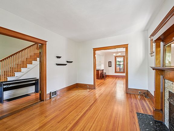 Living room, view into foyer and staircase
