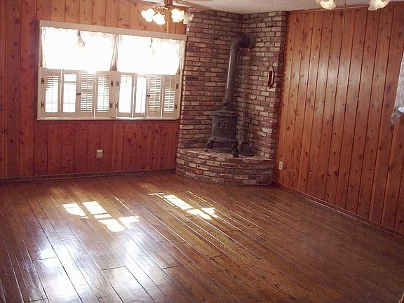 Den with PotBelly Fireplace