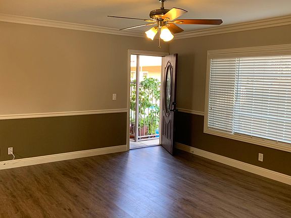 View of Living area with front door entry