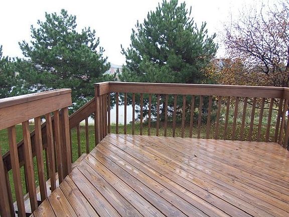 Large deck overlooks pond