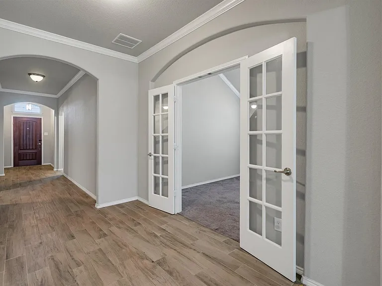 Wood-finish flooring throughout the entryway