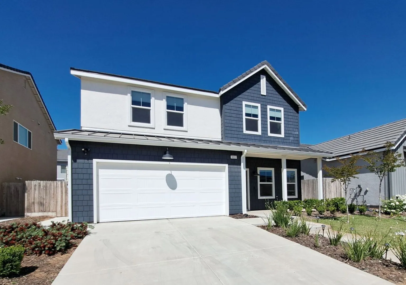 Spacious 2-story home: 4 bedrooms and 2.5 bathrooms in Madera, CA! — Photo 1