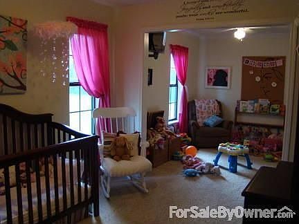 Back Bedroom
						:
						Could be a bedroom with an office. Has large walk in closet with great storage!