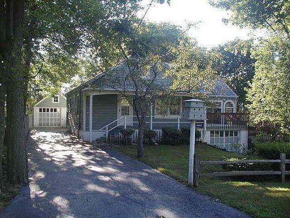 Home view w/ attached & detached Garages