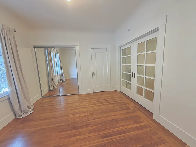 Bedroom with closed pocket doors