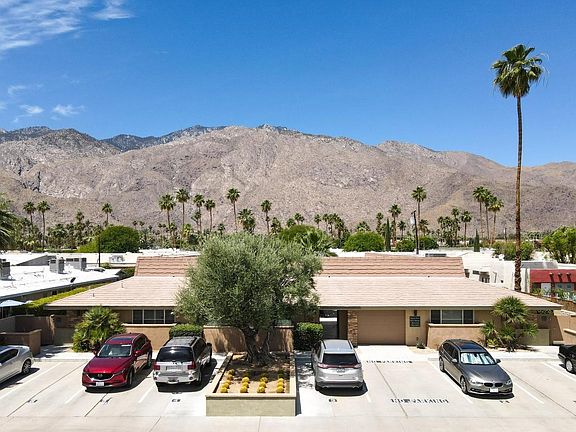 Front of complex with dedicated parking.