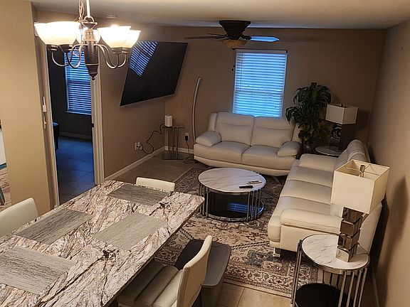 Furniture included minus rugs and TV