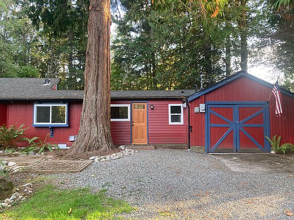 Front of home: west entrance and shed