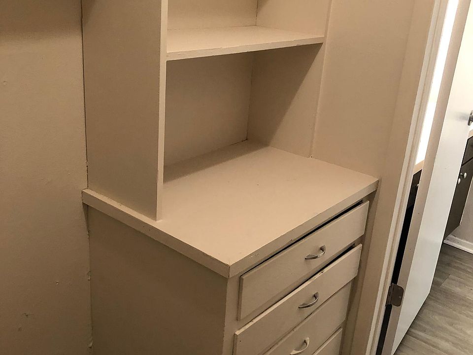 Walk in closet with built in dresser
