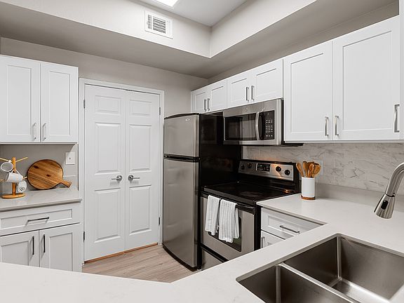 Subway Tile Backsplash and Shaker-Style Cabinets