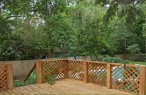 large back deck overlooking pool to nature preserve
