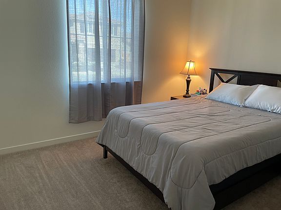 Downstairs bedroom, comes with closet