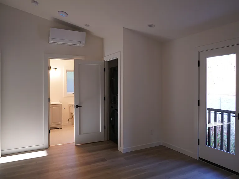 View of upstairs bathroom and laundry