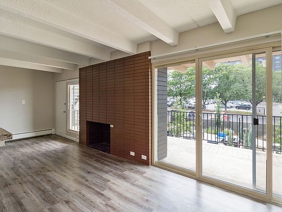 Floor to ceiling windows in the bright living space