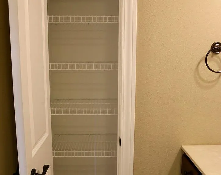Guest bathroom linen closet