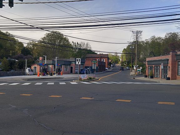 The apartment is in this quiet nexus of neighborhood streets and shops.
