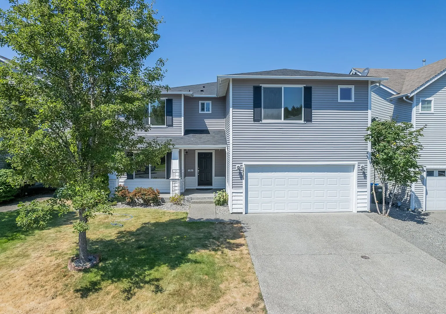 Come Home To Our Spacious 4 Bedroom Home in Puyallup — Photo 1