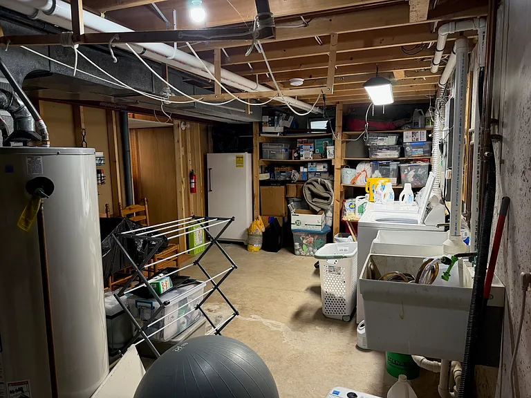 Laundry room located off of the lower rec room.