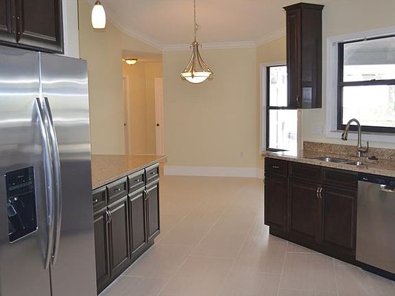 5th image of 8425 Palm Lakes Ct