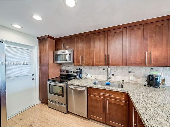 4th image of 3050 N Palm Aire Dr APT 401