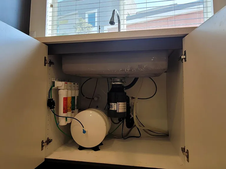 Kitchen sink, with garbage disposal and water filter RO System for drinking.