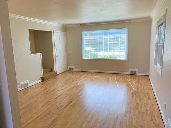 Living room with newly refinished hardwood floors