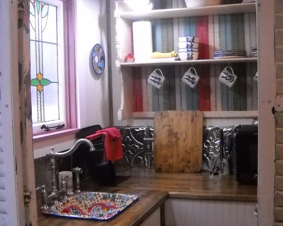 Kitchen- microwave, full sized toaster oven, fridge