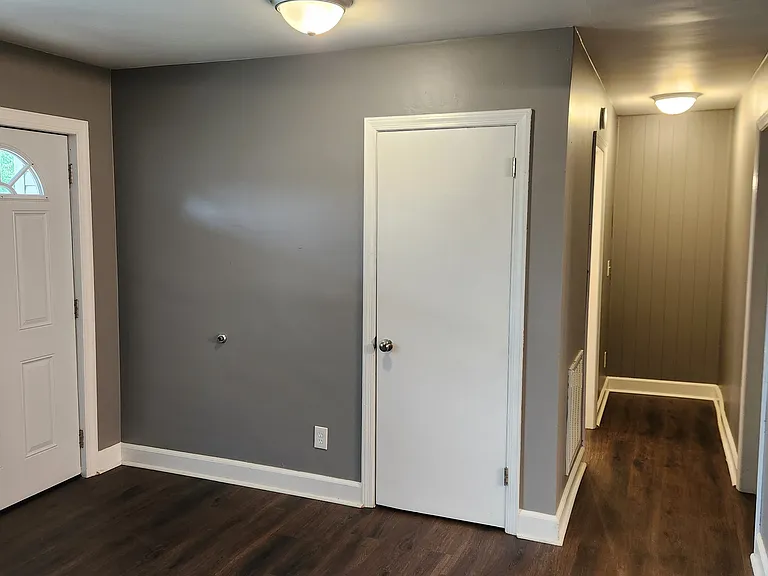 Hallway to bedroom #1 and bathroom. Looking from living room.