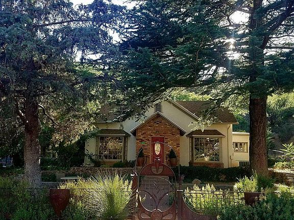 Front Yard with Massive Trees, Garden, Greenery, And Gorgeou
