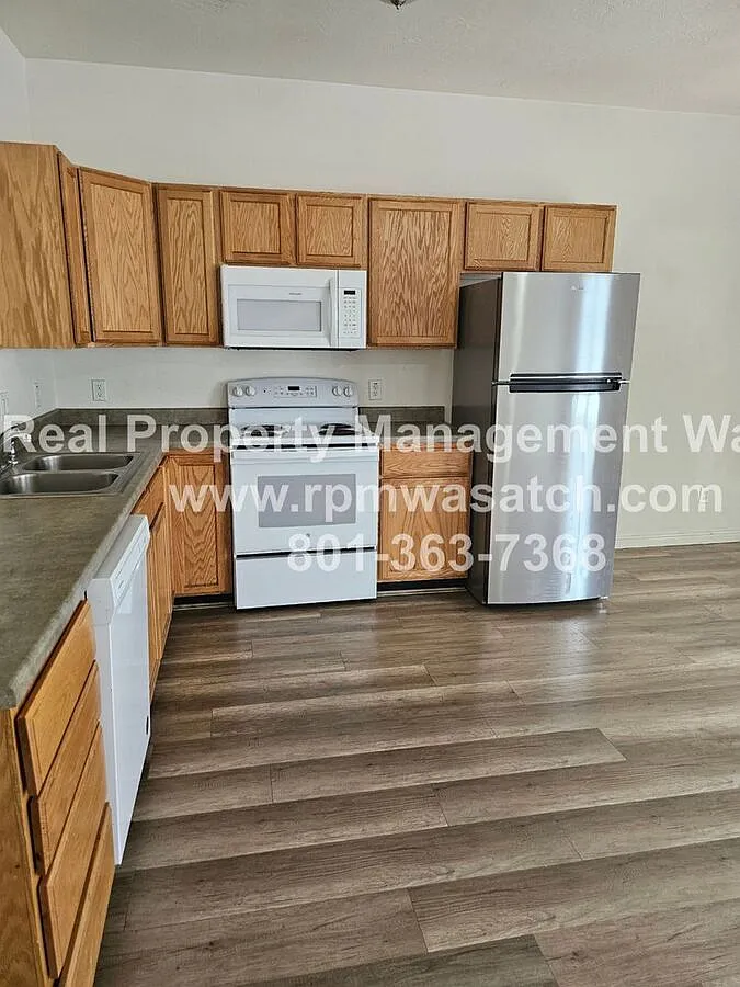 Come See This 3 Bedroom 2.5 Bathroom Town Home in West Valley City — Photo 4