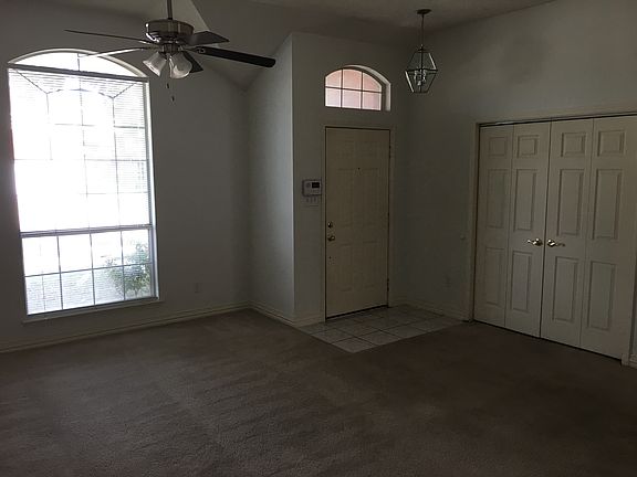 Front door and living room including doorway to studio / 4th