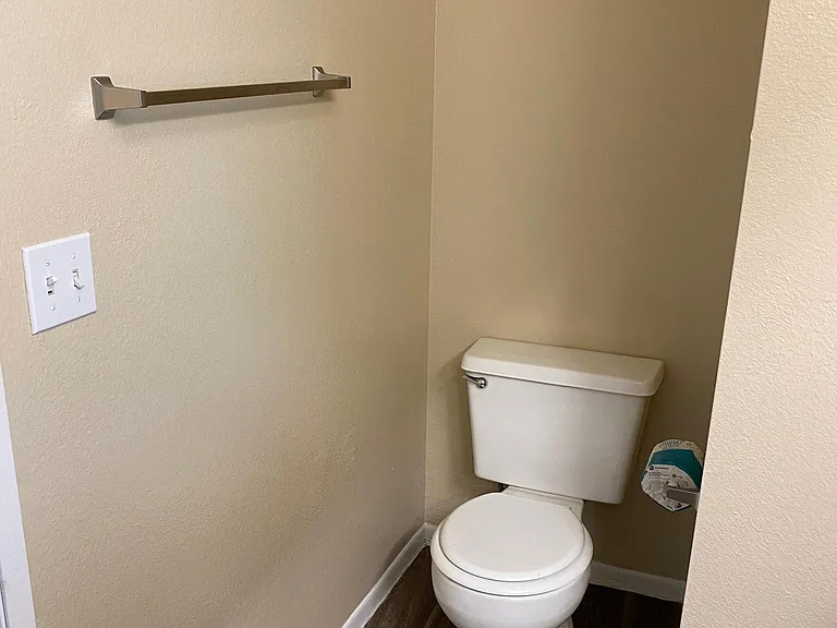 downstairs 2 bedroom - main bedroom bathroom - toilet