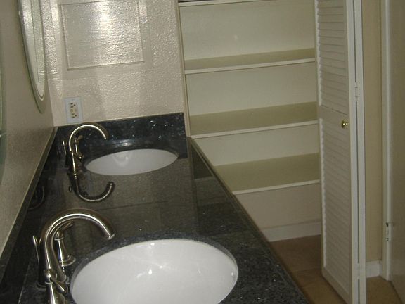 large linen closet in bathroom