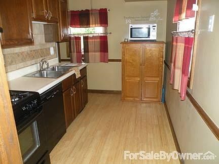 Laundry/Utility Room
						:
						Brand New Water Heater. Washer and Dryer remain with home!