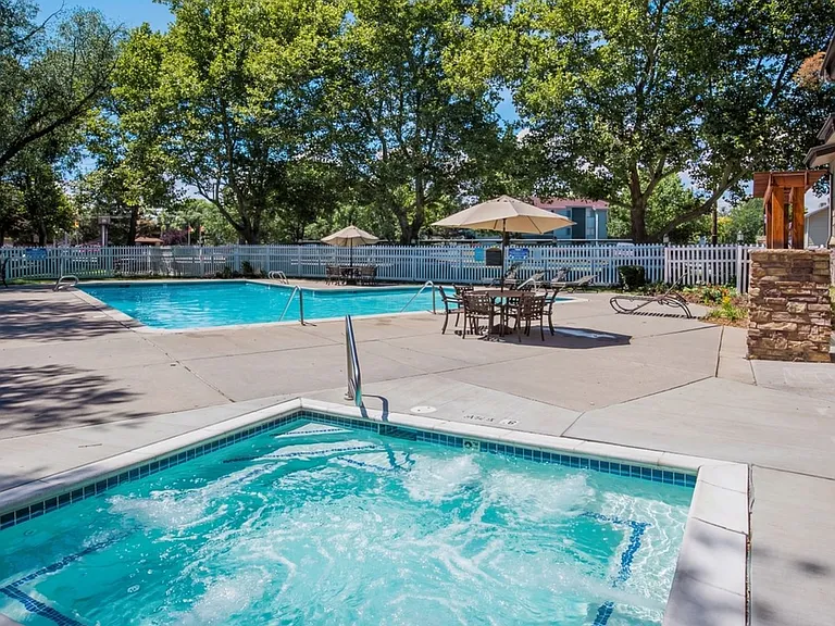 Relax by the resort-style pool and soak up the Salt Lake City sunshine at Fox Point in Old Farm Apartments