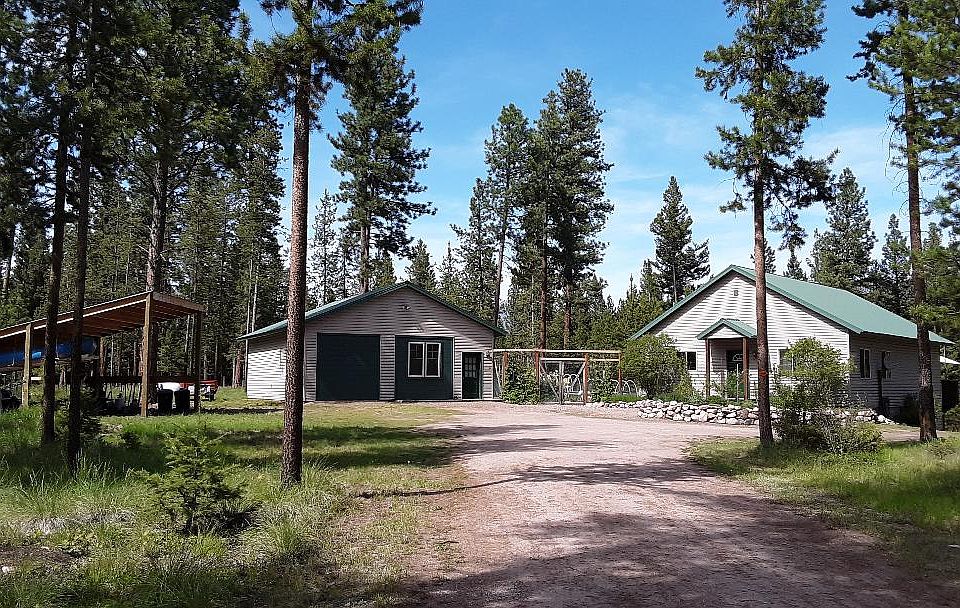 House, studio, and carport