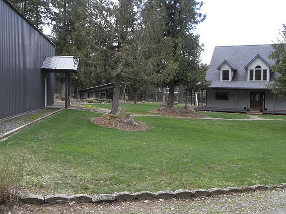 40x60 shop home in background