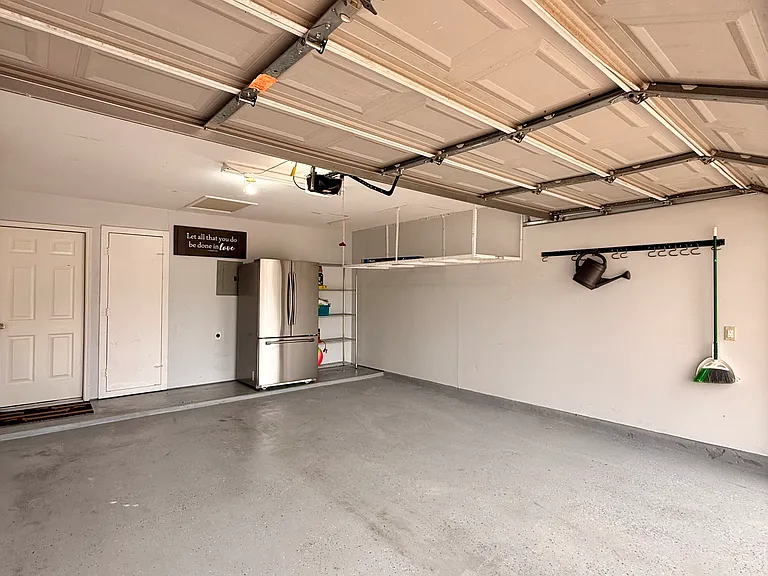 2-car garage with full second fridge