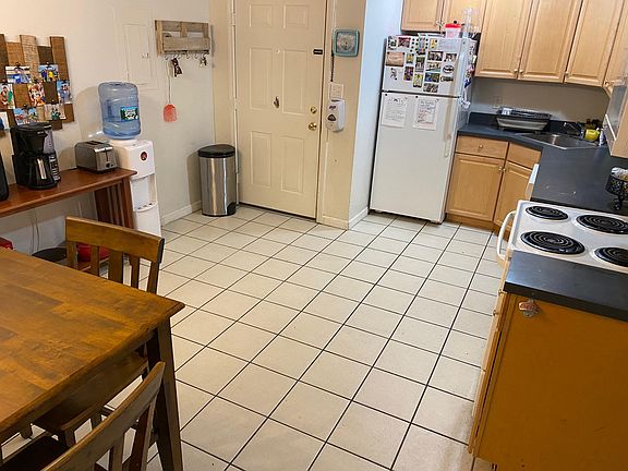 Kitchen comes with all of the appliances: Electric Stove & Oven, Refrigerator, Microwave, and Trash Disposal.
