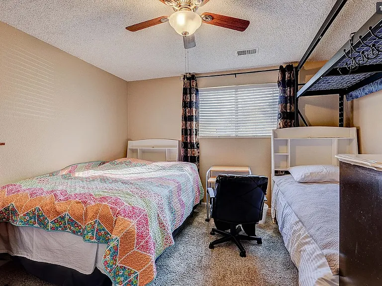 Master bedroom queen bed and XL twin bed