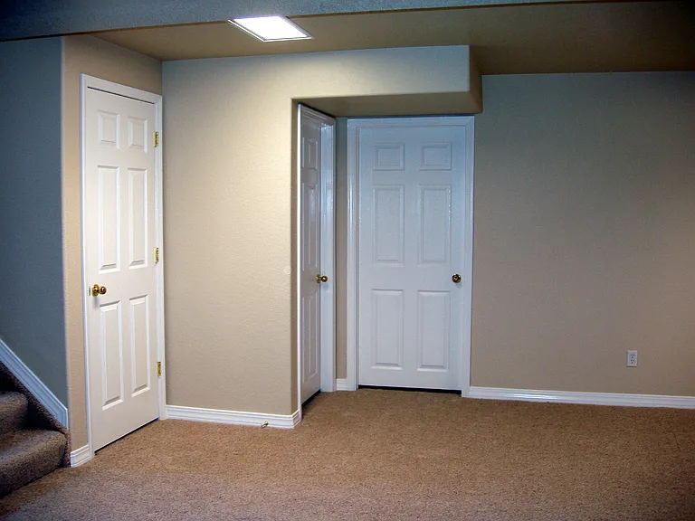 The two doors on the right are large Storage Areas.