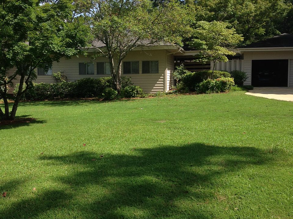 Large zoysia front lawn