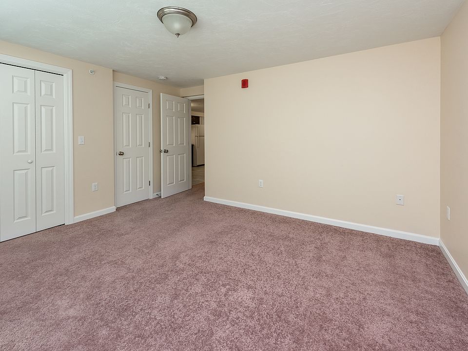 bedroom 2, standing in front of window