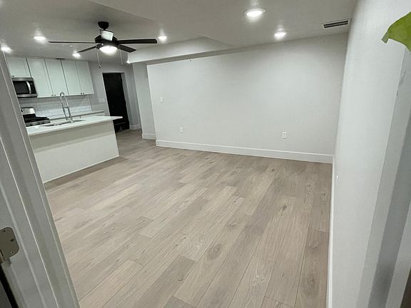 View from a bedroom of living area/ kitchen