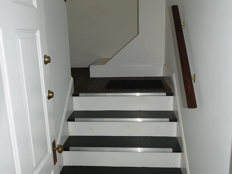 Inside door to private interior staircase