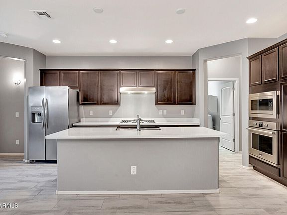 4th image of 12218 W ROWEL Road