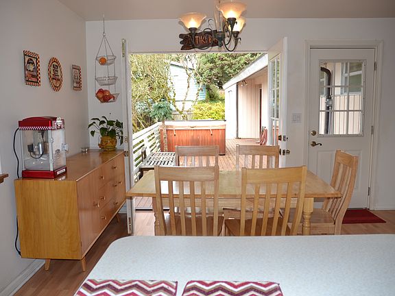French Doors lead from kitchen to deck and hot tub