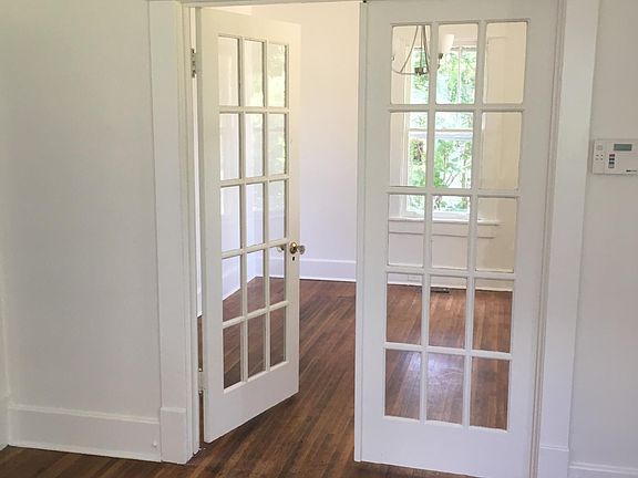 Living room looking into bed or dining room.