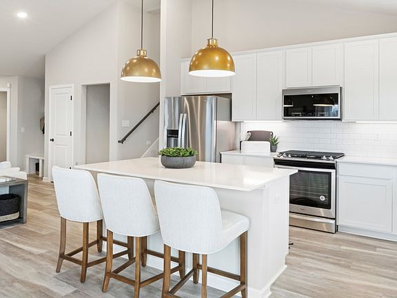 A kitchen designed for cooking, gathering, and living.